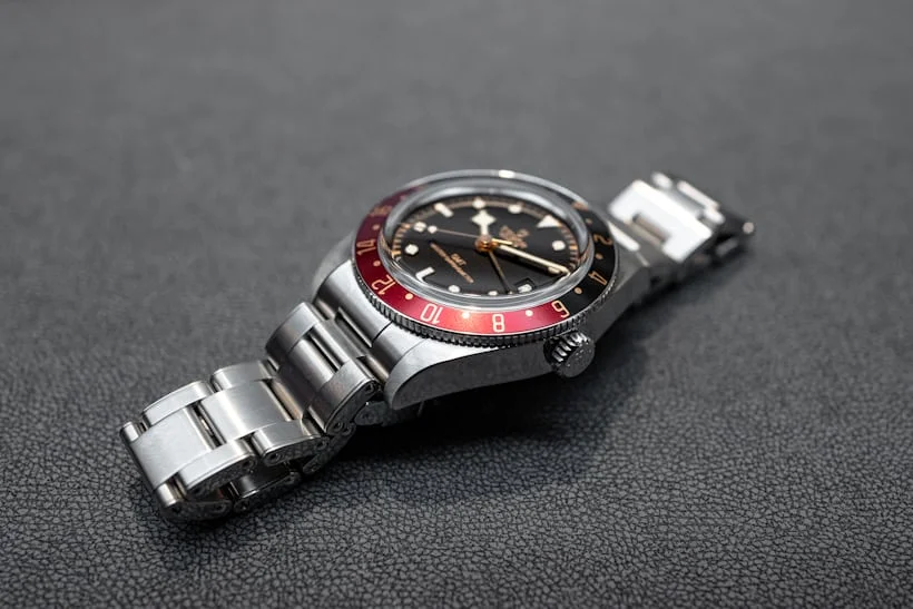 Side view of Tudor Black Bay GMT with stainless steel bracelet and Pepsi bezel